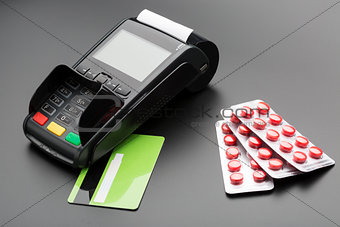 POS terminal, credit card and pill blister pack