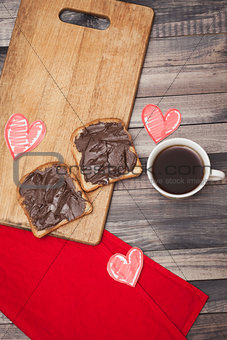 Coffee, toast and chocolate paste, romantic breakfast on Valentine's Day