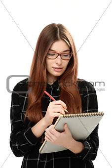 young woman holding sketchbook