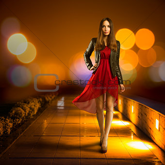 Woman in Red Dress Walking. Night City