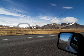 Car mirror on a the ring road in Iceland