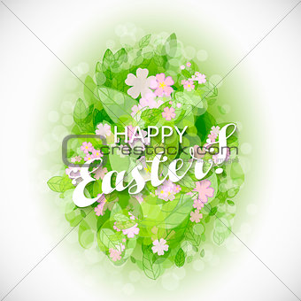 Beautiful card Easter egg with green leaves