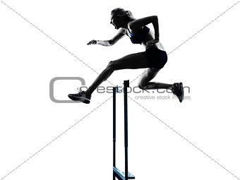 woman hurdlers  hurdling  silhouette