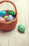 Wicker basket with easter eggs