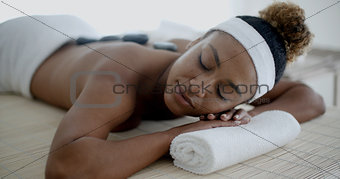 Young Female Relaxing In Spa Salon