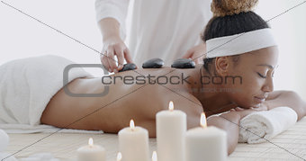 Woman Getting Hot Stone Massage