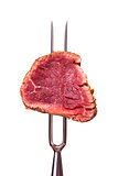 piece of steak on a meat fork 