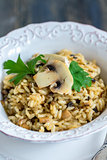 Risotto with mushrooms, onions and parsley.