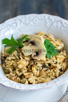 Risotto with mushrooms, onions and parsley.