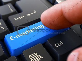E-Marketing - Concept on Blue Keyboard Button.