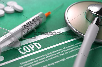 COPD. Medical Concept on Green Background.