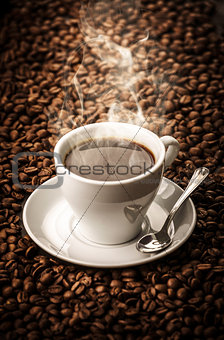 Hot coffee with beans background