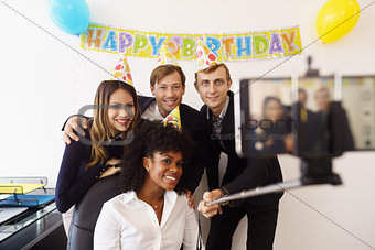 Business People Taking Selfie With Phone At Office Party
