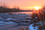 Dawn over Rushing winter river