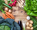 Fresh organic bio vegetables on wooden background