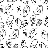Seamless pattern with the hand drawn ink doodle hearts.