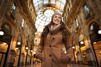 Woman in Galleria Vittorio Emanuele II looking into distance