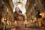 Woman in Galleria Vittorio Emanuele II looking into the distance