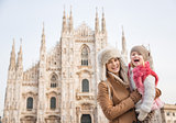 Portrait of mother and daughter in front of Duomo in Milan