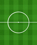 green football field with central circle