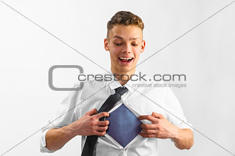 man opening his shirt