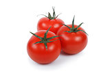 Three tomatoes over white.