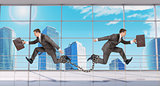 Two businessmen linked chain running