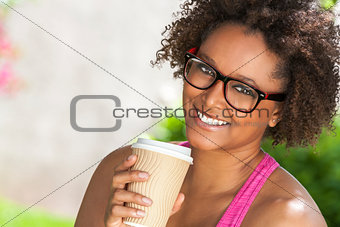 African American Woman In Glasses Drinking Coffee 