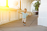 Asian toddler running at outdoor