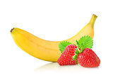 Ripe fresh banana and juicy strawberry with green leaf