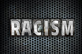 Racism Concept Metal Letterpress Type