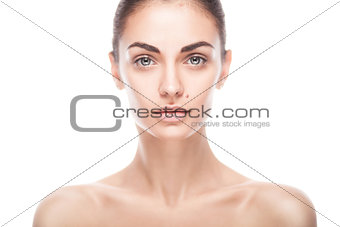 closeup portrait of young adult woman with clean fresh skin