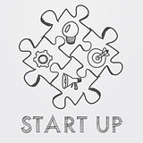 start up and business concept signs in puzzle pieces