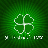 St. Patrick's Day with green shamrock and rays