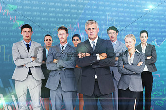 Composite image of business team standing arms crossed