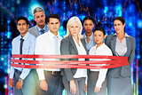 Composite image of unhappy business people surrounding by red strip