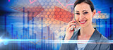 Composite image of businesswoman on the phone