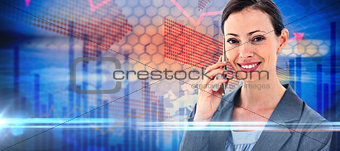 Composite image of businesswoman on the phone