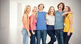 Composite image of full length of a group laughing together and looking at the camera