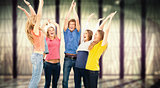 Composite image of group of friends cheering as they jump in the air and look at one another