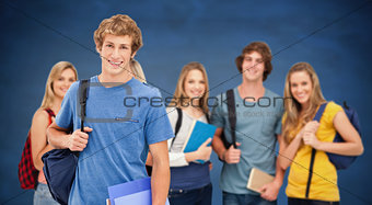 Composite image of a group of smiling college students look into the camera as one man stands in fro