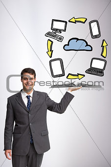 Composite image of businessman showing a book