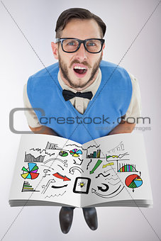 Composite image of nerd showing a book