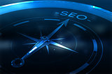Composite image of compass pointing to seo