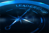 Composite image of compass pointing to leadership