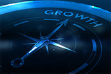 Composite image of compass pointing to growth