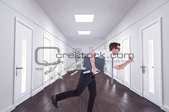 Composite image of running businessman