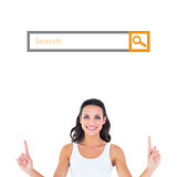 Composite image of pretty brunette pointing with fingers