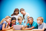 Composite image of cute pupils using tablet computer in library