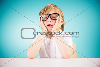 Composite image of cute pupil looking at camera